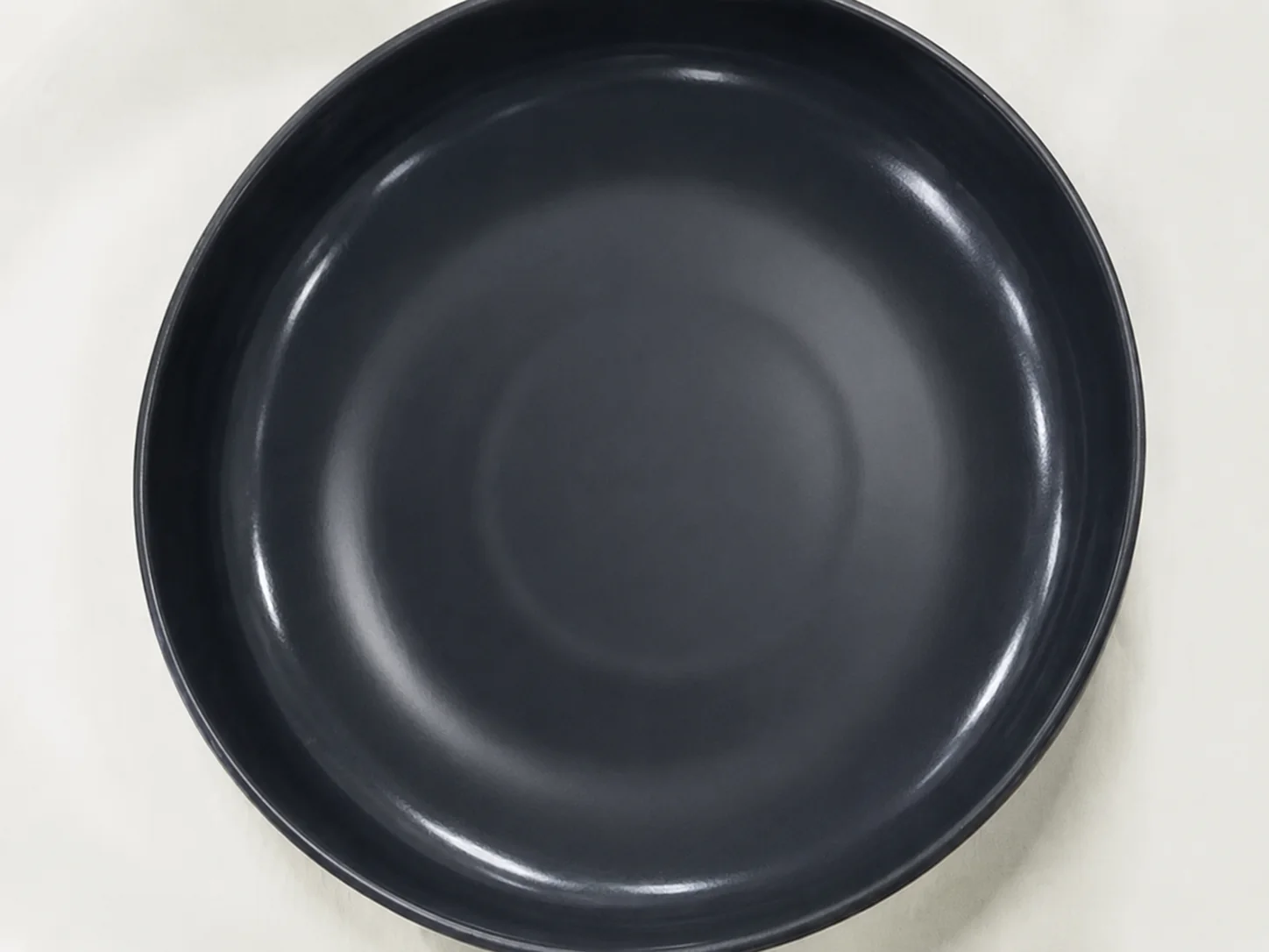Black ceramic pan after extended salt-water corrosion test